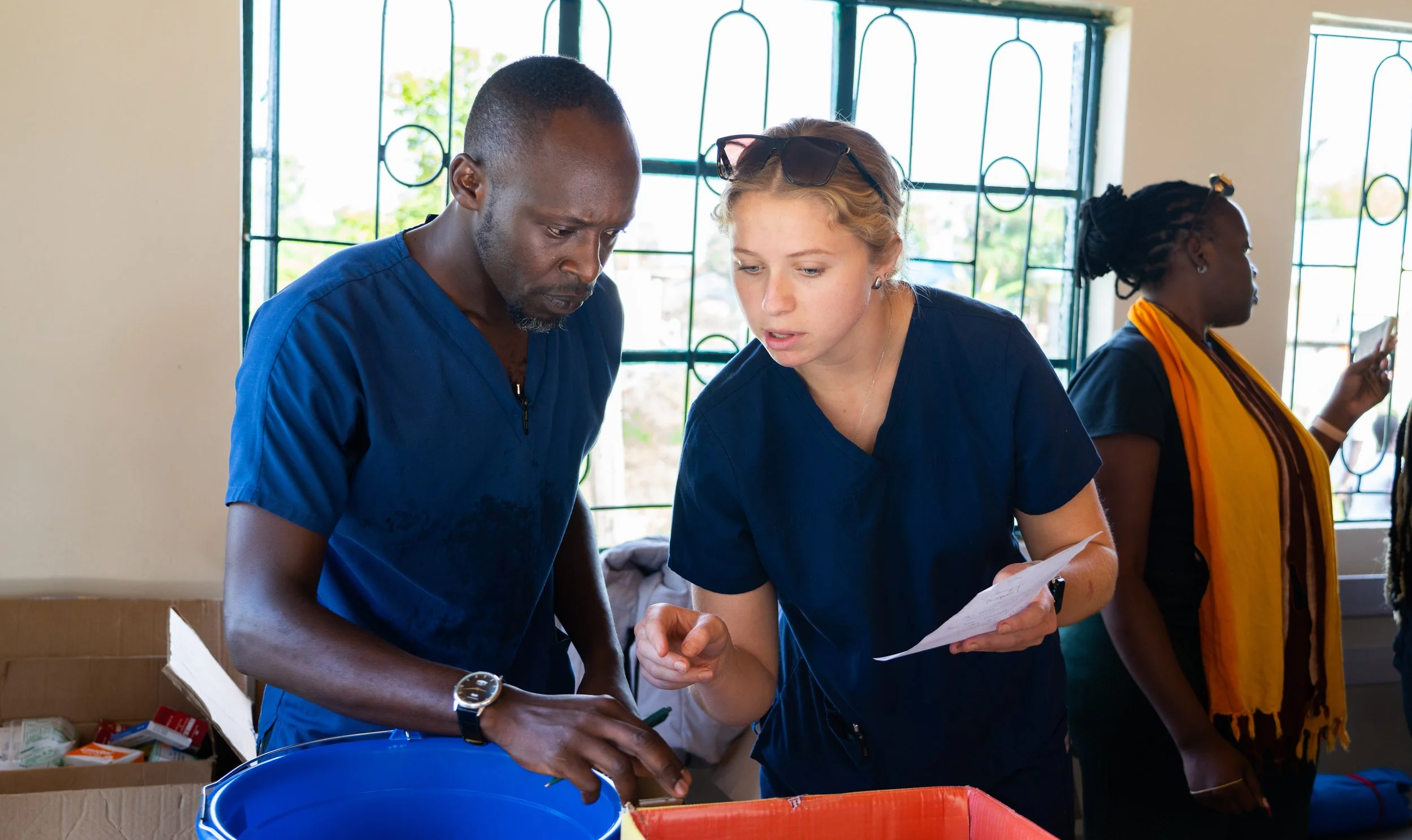 Nursing students working alongside caregivers